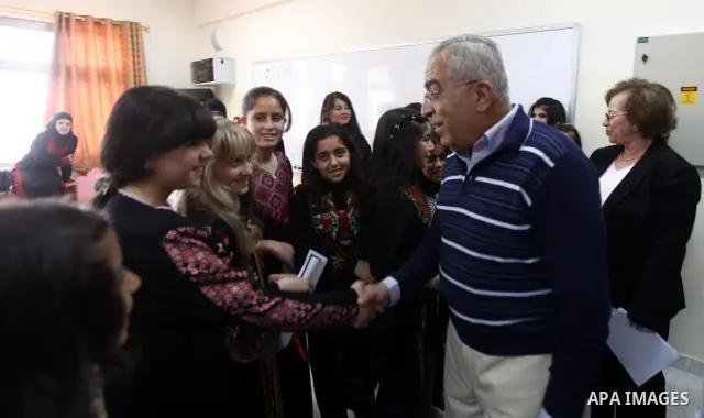 Palestinian Prime Minister Salam Fayyad arrives to pay a visit to support Palestinian farmers in the Yanun village near the West Bank City of Nablus, 05 April 2012. The village was temporarily abandoned by its residents...