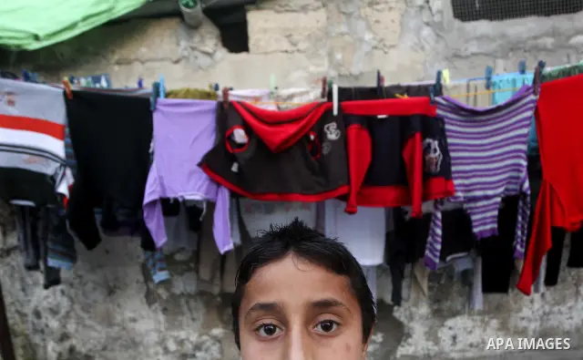 Palestinian children play in the streets of the Jabaliya refugee camp, northern Gaza Strip, 05 April 2012. The United Nations Relief and Works Agency (UNRWA) states that the Israeli blockade on Gaza has made life more di...