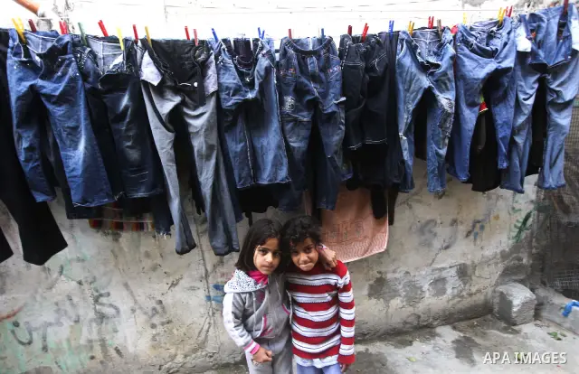 Palestinian children play in the streets of the Jabaliya refugee camp, northern Gaza Strip, 05 April 2012. The United Nations Relief and Works Agency (UNRWA) states that the Israeli blockade on Gaza has made life more di...