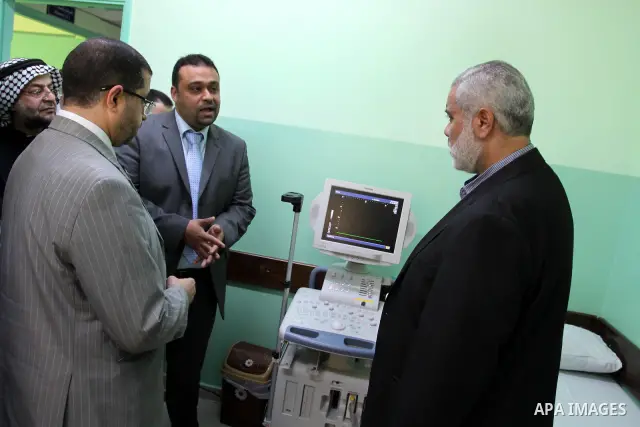 Palestinian Prime Minister in Gaza Strip, Ismail Haniya, attends the opening of the public service of the hospital Heart and blood vessels in Gaza City, on Apr. 08, 2012. Photo by Mohammed Asad