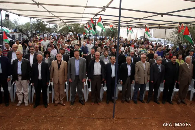 Palestinian Prime Minister Salam Fayyad, participates in the Sixth International Conference of the Bil'in popular resistance, in the village of Bil'in, in the West Bank city of Ramallah April 10, 2012. Photo by Issam Rim...