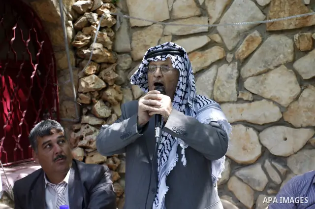 Palestinian revolution poet Ibrahim Abu Saleh ''Abu Arab" visits the village of Bathan near the West Bank city of Nablus, Wednesday, April 11, 2012. Photo by Wagdi Eshtayah