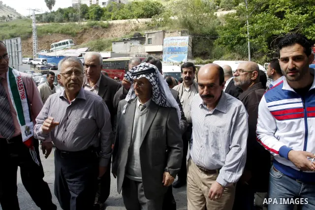 Palestinian revolution poet Ibrahim Abu Saleh ''Abu Arab" visits the village of Bathan near the West Bank city of Nablus, Wednesday, April 11, 2012. Photo by Wagdi Eshtayah