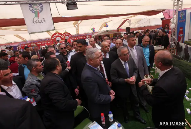 Palestinian Prime Minister Salam Fayyad attend Opening Ceremony of the food industry exhibition at the University of Hebron in west bank city of Hebron on April 11, 2012 Fayyad Inspect the first exhibition of agricultura...