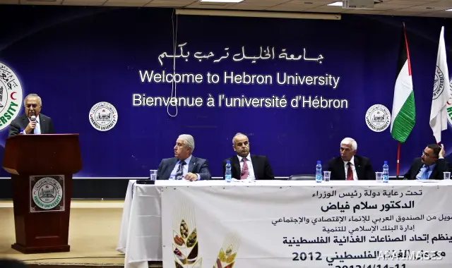 Palestinian Prime Minister Salam Fayyad attend Opening Ceremony of the food industry exhibition at the University of Hebron in west bank city of Hebron on April 11, 2012 Fayyad Inspect the first exhibition of agricultura...