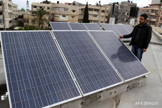 Palestinian civil society organizations "NGOs" donate to project supply of solar panels to the run of Medical equipment in Gaza hospitals, in Gaza City, on April, 12, 2012. Photo by Mohammed Asad