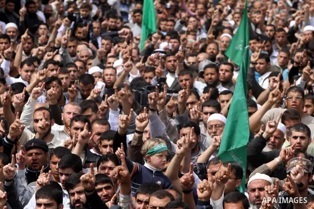 Palestinian Hamas supporters take part in a rally in Jabalya, in the northern Gaza Strip, April 13, 2012, calling for the release of Palestinian prisoners from Israeli jails. Photo by Mohammed Asad