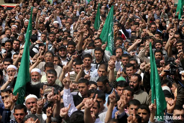 Palestinian Hamas supporters take part in a rally in Jabalya, in the northern Gaza Strip, April 13, 2012, calling for the release of Palestinian prisoners from Israeli jails. Photo by Mohammed Asad