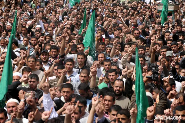 Palestinian Hamas supporters take part in a rally in Jabalya, in the northern Gaza Strip, April 13, 2012, calling for the release of Palestinian prisoners from Israeli jails. Photo by Mohammed Asad