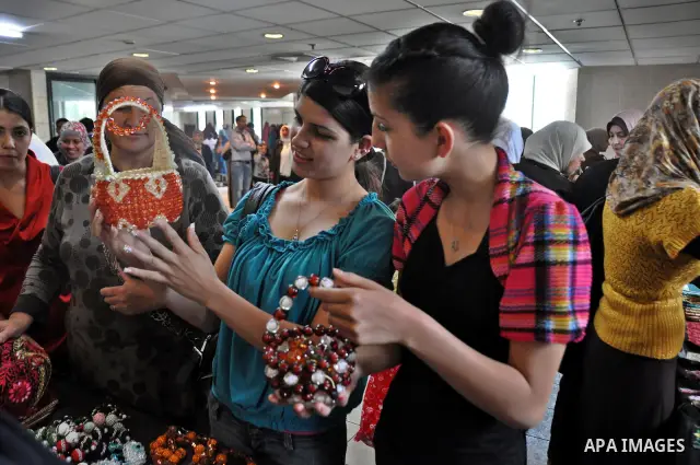 Palestinians participate in an exhibition in the first Palestinian Heritage Jerusalem, in the West Bank city of Nablus, April. 14, 2012. Photo by Nedal Shtieh.