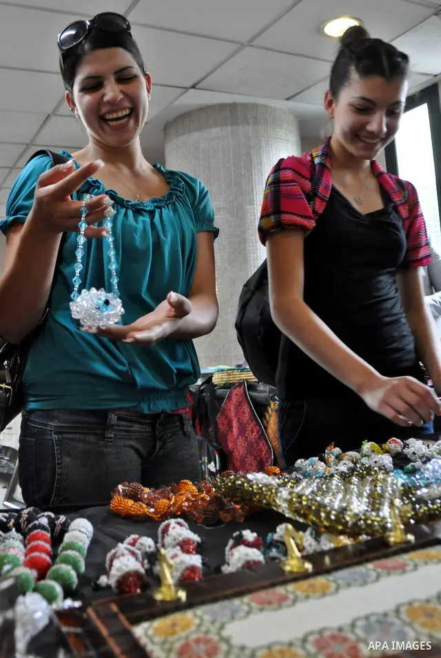 Palestinians participate in an exhibition in the first Palestinian Heritage Jerusalem, in the West Bank city of Nablus, April. 14, 2012. Photo by Nedal Shtieh.
