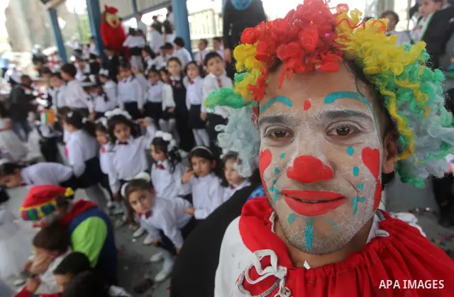 Palestinian children take part in a celebration to mark the International Children Day in Gaza city on April, 15, 2012. Photo by Ashraf Amra
