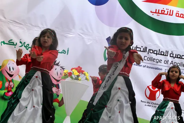 Palestinian children take part in a celebration to mark the International Children Day in Gaza city on April, 15, 2012. Photo by Mohammed Asad