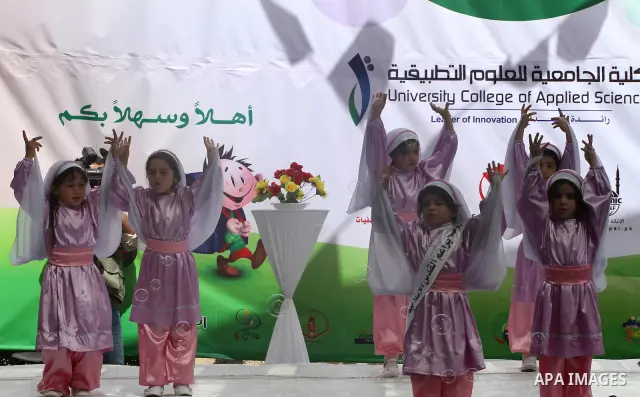 Palestinian children take part in a celebration to mark the International Children Day in Gaza city on April, 15, 2012. Photo by Mohammed Asad