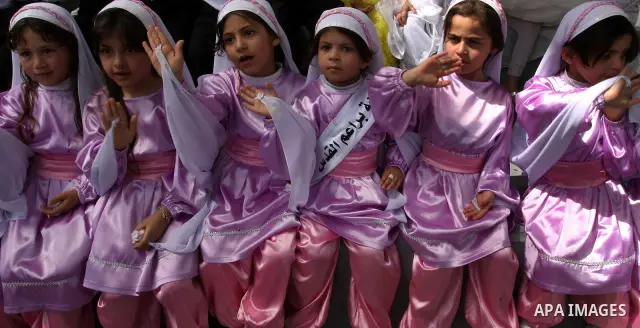 Palestinian children take part in a celebration to mark the International Children Day in Gaza city on April, 15, 2012. Photo by Mohammed Asad