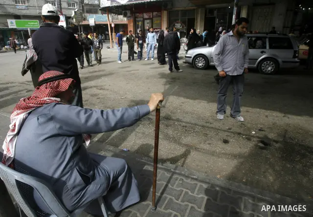 Palestinians wait a taxis in the street after the fuel shortage in Rafah in Gaza Strip on April, 15, 2012. Palestinians in the Gaza Strip are suffering a crisis of dry petrol pumps and frequent blackouts triggered by a f...