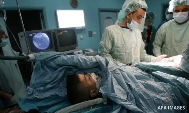 Palestinian doctors perform the first surgery to lengthen a child, "dwarf" in Abu Yousef Al Najjar hospital in Rafah city in the southern Gaza Strip, on April,15, 2012. Photo by Eyad Al Baba