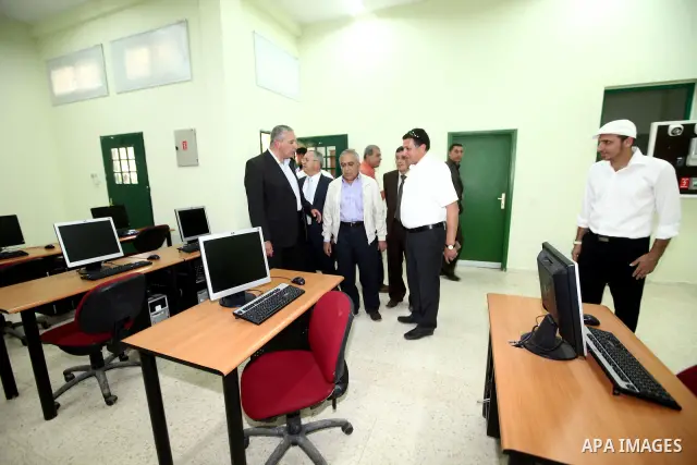 Palestinian Prime Minister, Salam Fayyad visits the training centre of Jerusalem governate power company in the West Bank city of Jericho, April 16, 2012. Photo by Mustafa Abu Dayeh