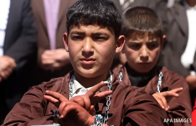 Palestinian children take part in a rally in front of the Red Cross headquarters in Gaza City marking Palestinian Prisoners Day April 17, 2012. The Israeli Prisons Authority said on Tuesday in a written statement that 2,...