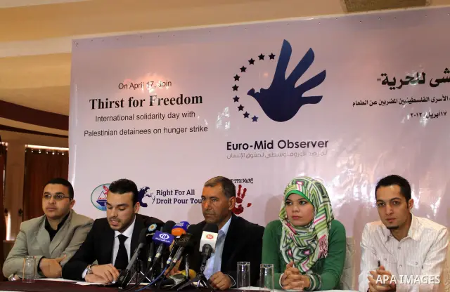 Palestinians take part in a press conference under the supervision of "Euro-Mediterranean" organization and 300 organization non-governmental entitled "Thirst for Freedom", to discuss issue of the prisoners in Israeli ja...