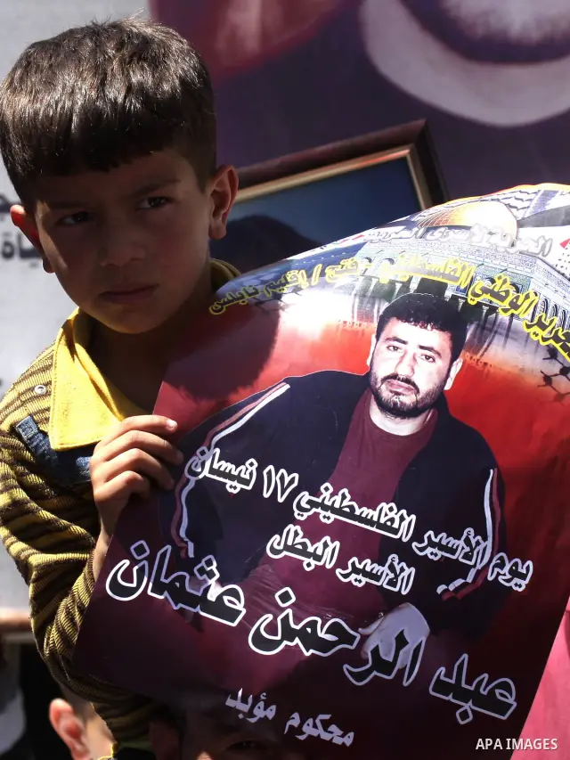 Palestinians participate in a demonstration calling for the release of Palestinian prisoners jailed in Israel, in the West Bank city of Nablus,Israel is currently 1,200 of Palestinians in its prisons. have begun a hunger...