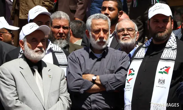Palestinian factions demonstrate in solidarity with prisoners jailed in Israel on the annual prisoners day, in Gaza City, Tuesday, April 17, 2012. The Israeli prison service said Tuesday hundreds of Palestinian prisoners...