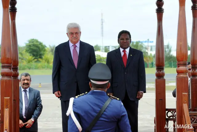 Palestinian President Mahmoud Abbas, received by Maldives President, Mohammed Waheed Hassan, upon arrival at the airport in Male, Maldives, Tuesday, April 17, 2012. Photo by Thaer Ganaim