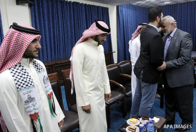 Palestinian Prime Minister in Gaza Strip, Ismail Haniya receives the Bahrani delegation in his office in Gaza city on April 18, 2012. Photo by Mohammed Asad