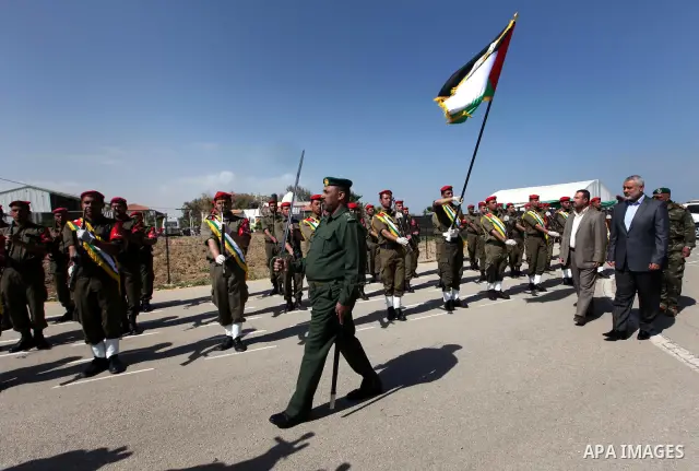 Palestinian Prime Minister in Gaza Strip, Ismail Haniya attends a graduation ceremony from a military course "Martyrs of Homeland Security" in Gaza City, on April, 19, 2012.. Photo by Ahmad Shaat
