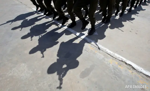 April 19, 2012 - Gaza City, Gaza Strip - The shadows of Palestinian Hamas security force members during a graduation ceremony. (Credit Image: © Yasser Qudih/Xinhua/ZUMAPRESS.com)