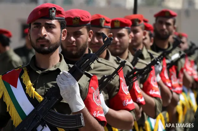 Palestinian Hamas National security force officers stand to attention during their graduation ceremony in Gaza City on April 19, 2012. Photo by Mohammed Asad