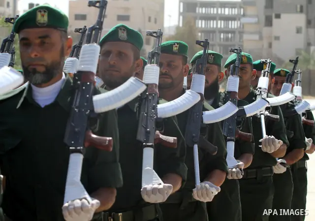 Palestinian Hamas National security force officers stand to attention during their graduation ceremony in Gaza City on April 19, 2012. Photo by Mohammed Asad