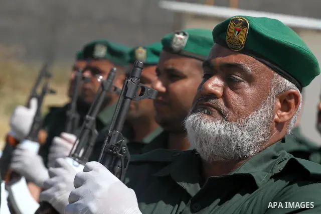 Palestinian Hamas National security force officers stand to attention during their graduation ceremony in Gaza City on April 19, 2012. Photo by Mohammed Asad