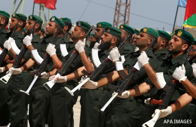 Palestinian Hamas National security force officers stand to attention during their graduation ceremony in Gaza City on April 19, 2012. Photo by Mohammed Asad