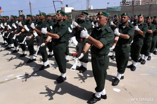 Palestinian Hamas National security force officers stand to attention during their graduation ceremony in Gaza City on April 19, 2012. Photo by Mohammed Asad