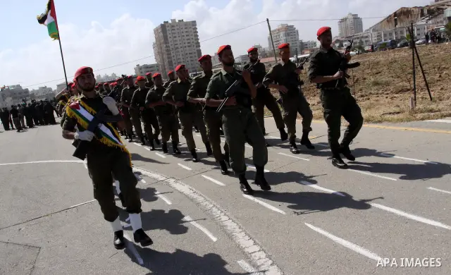 Palestinian Hamas National security force officers stand to attention during their graduation ceremony in Gaza City on April 19, 2012. Photo by Mohammed Asad