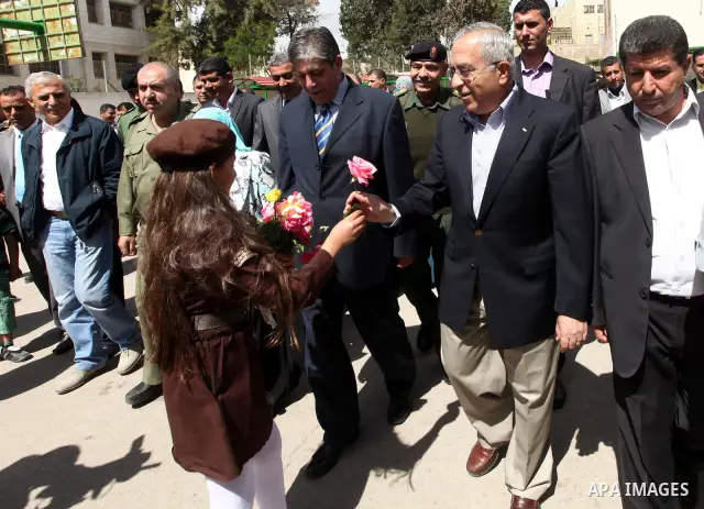 Palestinian prime minister Salam Fayyad during an inspecting visit in Tobas governorate and outskirts of the West Bank Jordan Valley. on April 19, 2012. Photo by Mustafa Abu Dayeh