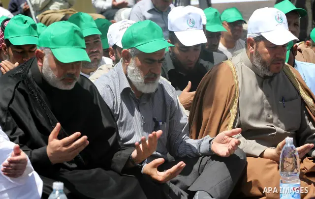Palestinian Prime Minister in Gaza Ismail Haniya attends a protest in solidarity with Palestinian prisoners being held in Israeli jails, following the Friday noon prayers, in Gaza City, on April 20, 2012. Photo by Mohamm...