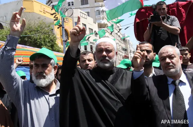 Palestinian Prime Minister in Gaza Ismail Haniya attends a protest in solidarity with Palestinian prisoners being held in Israeli jails, following the Friday noon prayers, in Gaza City, on April 20, 2012. Photo by Mohamm...