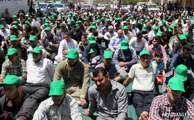 Palestinian Prime Minister in Gaza Ismail Haniya attends a protest in solidarity with Palestinian prisoners being held in Israeli jails, following the Friday noon prayers, in Gaza City, on April 20, 2012. Photo by Mohamm...