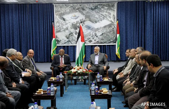 Palestinian Prime Minister in Gaza Strip, Ismail Haniya receives delegation of the International lawyers in his office in Gaza city on April 21, 2012. Photo by Ashraf Amra
