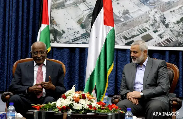 Palestinian Prime Minister in Gaza Strip, Ismail Haniya receives delegation of the International lawyers in his office in Gaza city on April 21, 2012. Photo by Ashraf Amra