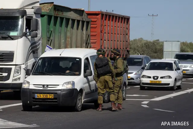 Israeli soldiers closed Tappuah checkpoint, after arrested two Palestinians young their has a pistol and explosion materials. southern Nablus city in the west bank,on April 21, 2012. Photo by Nedal Eshtaya