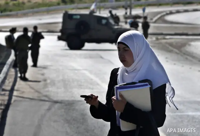 Israeli soldiers closed Tappuah checkpoint, after arrested two Palestinians young their has a pistol and explosion materials. southern Nablus city in the west bank,on April 21, 2012. Photo by Nedal Eshtaya