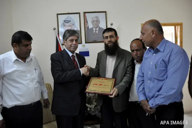 Palestinian Khader Adnan, a senior member of Islamic Jihad, who didn't eat for 66 days, was set to be freed later as part of a deal reached with Israel, during a ceremony honoring from province of Tubas, in the West Bank...