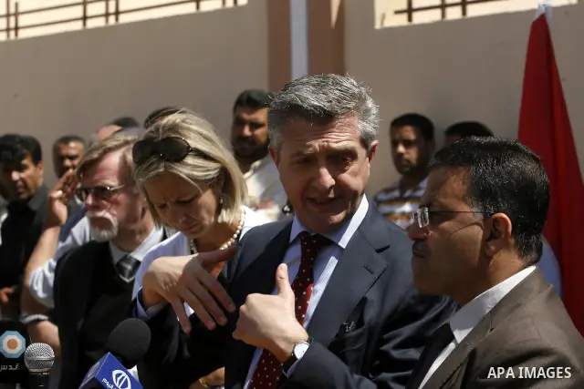 Birgitta Tazelaar head of the Netherlands Representation to the Palestinian Authority, alongside UNRWA's Filippo Grandi, during a ceremony in Khan Younis, in the southern Gaza Strip, on April 24, 2012. Palestinians whose...