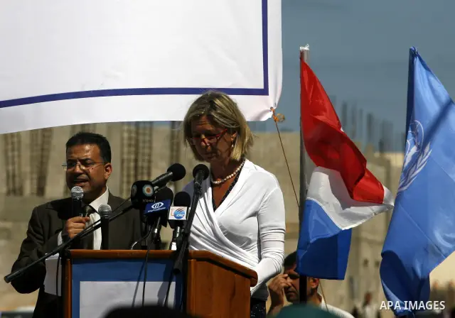 Birgitta Tazelaar (3rd R), head of the Netherlands Representation to the Palestinian Authority, speaks during a ceremony in Khan Younis, in the southern Gaza Strip, on April 24, 2012. Palestinians whose houses were destr...