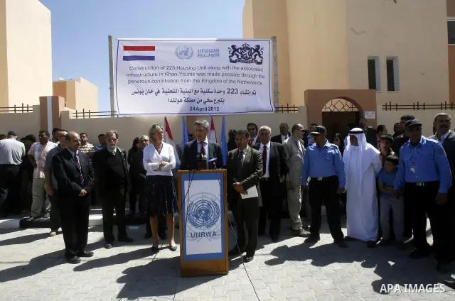 Birgitta Tazelaar head of the Netherlands Representation to the Palestinian Authority, alongside UNRWA's Filippo Grandi, during a ceremony in Khan Younis, in the southern Gaza Strip, on April 24, 2012. Palestinians whose...