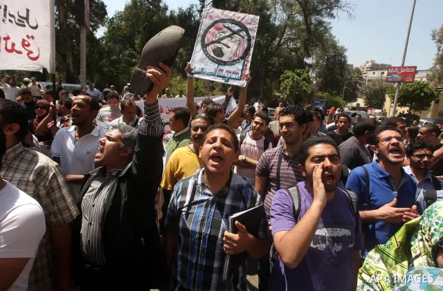 Egyptian protesters take part in a demonstration in front of the Saudi Arabian embassy in Cairo on April 24, 2012, calling for the release of Egyptians who have been detained in the kingdom, including Ahmed Al-Gizawi who...