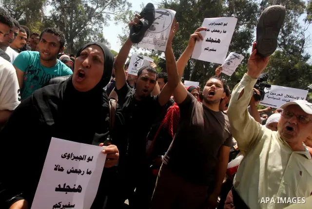 Egyptian protesters take part in a demonstration in front of the Saudi Arabian embassy in Cairo on April 24, 2012, calling for the release of Egyptians who have been detained in the kingdom, including Ahmed Al-Gizawi who...